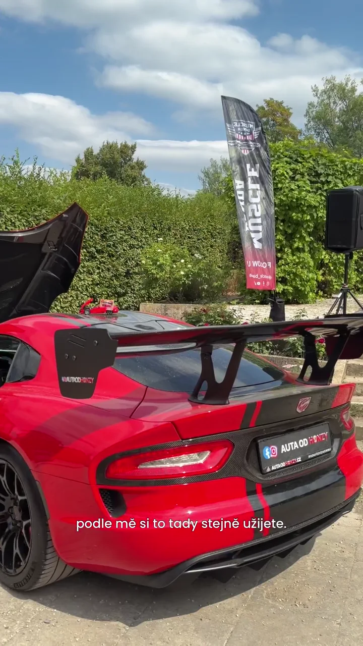 GT Sports supercars displayed at an outdoor automotive event